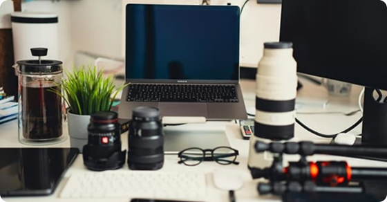Content production equipment arranged around a laptop