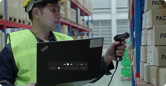 Worker using a connected scanner and laptop