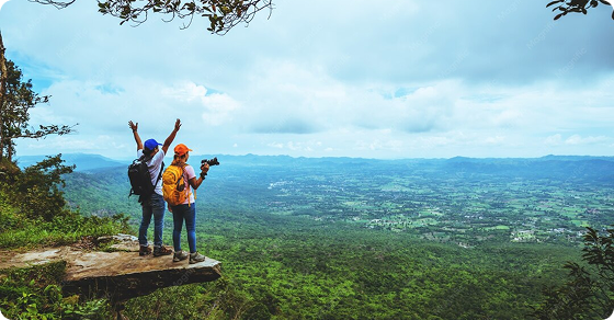 Travelers enjoying a panoramic mountain view