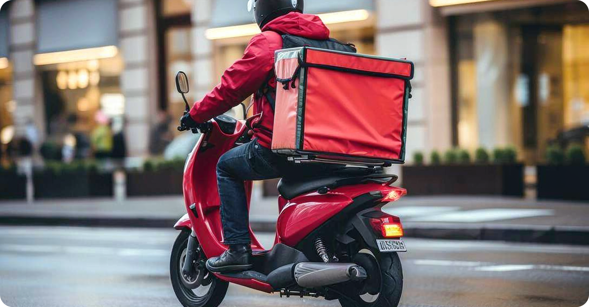 Food delivery rider carrying a delivery box